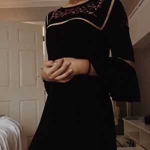 black dress w floral detailing